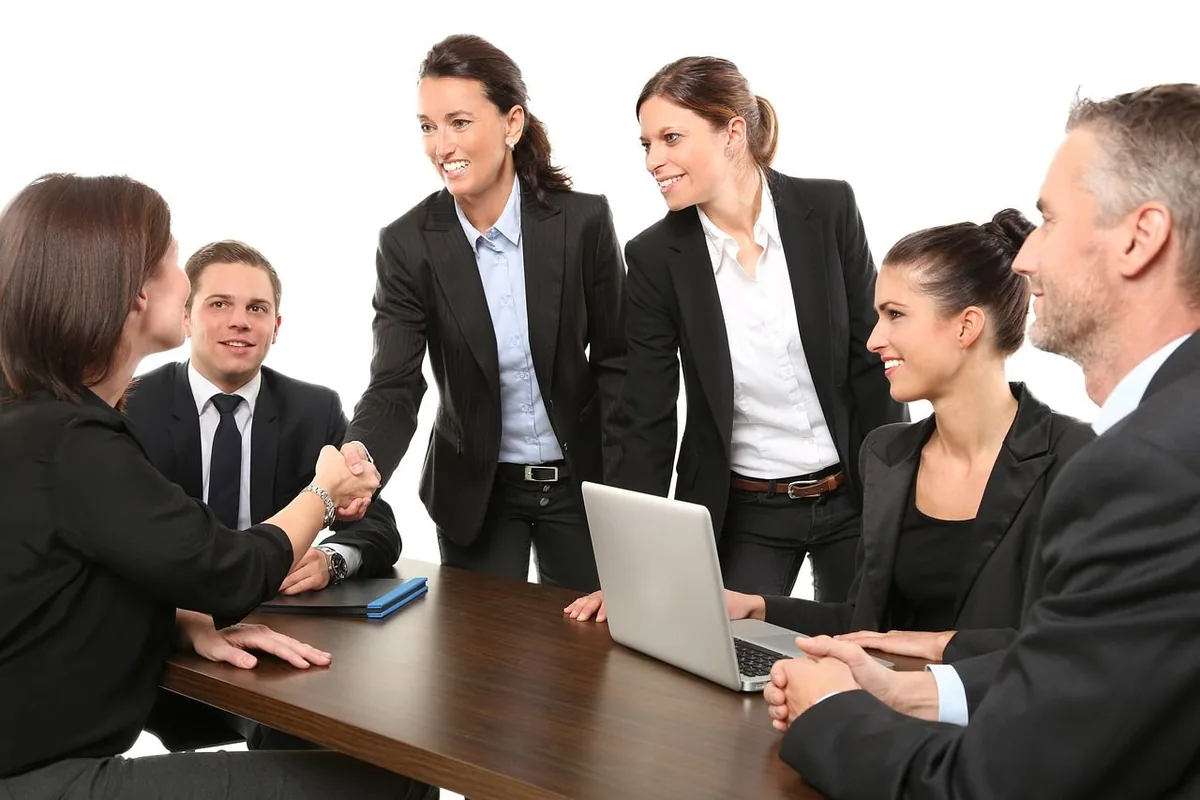 Motivated corporate professional smiling during career development discussion